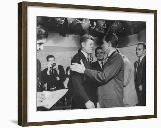 Presidential Candidate John F. Kennedy Speaking to Fellow Candidate Richard M. Nixon-Ed Clark-Framed Photographic Print