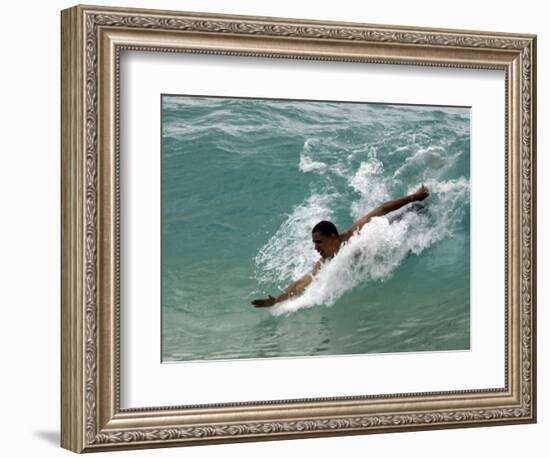 Presidential Candidate Senator Barack Obama, On Vacation, Body Surfing at a Beach, Honolulu, Hawaii-null-Framed Photographic Print