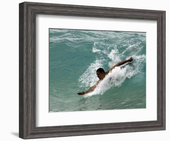 Presidential Candidate Senator Barack Obama, On Vacation, Body Surfing at a Beach, Honolulu, Hawaii-null-Framed Photographic Print