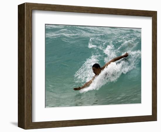 Presidential Candidate Senator Barack Obama, On Vacation, Body Surfing at a Beach, Honolulu, Hawaii-null-Framed Photographic Print