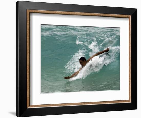 Presidential Candidate Senator Barack Obama, On Vacation, Body Surfing at a Beach, Honolulu, Hawaii-null-Framed Photographic Print