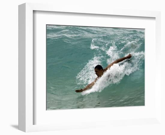 Presidential Candidate Senator Barack Obama, On Vacation, Body Surfing at a Beach, Honolulu, Hawaii-null-Framed Photographic Print