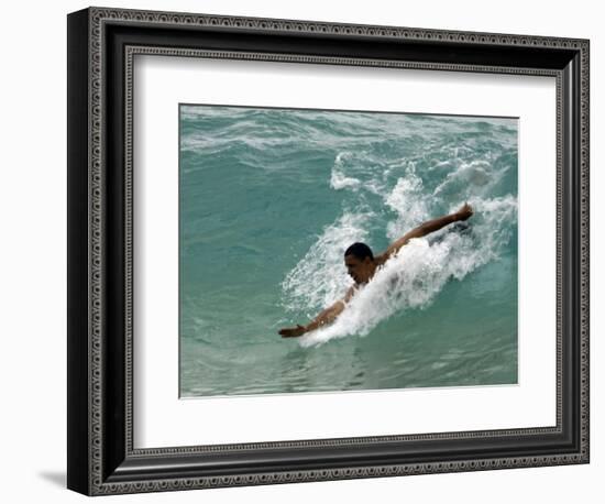 Presidential Candidate Senator Barack Obama, On Vacation, Body Surfing at a Beach, Honolulu, Hawaii-null-Framed Photographic Print