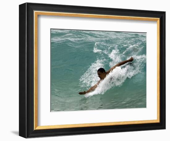 Presidential Candidate Senator Barack Obama, On Vacation, Body Surfing at a Beach, Honolulu, Hawaii-null-Framed Photographic Print