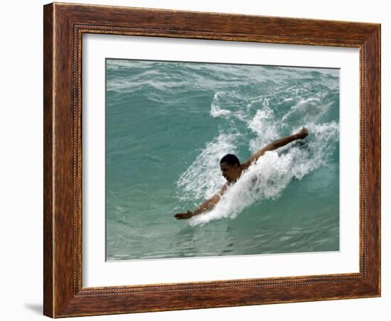 Presidential Candidate Senator Barack Obama, On Vacation, Body Surfing at a Beach, Honolulu, Hawaii-null-Framed Photographic Print