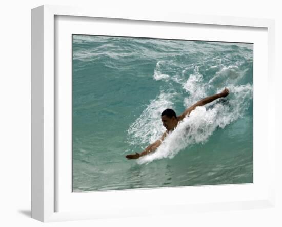 Presidential Candidate Senator Barack Obama, On Vacation, Body Surfing at a Beach, Honolulu, Hawaii-null-Framed Photographic Print