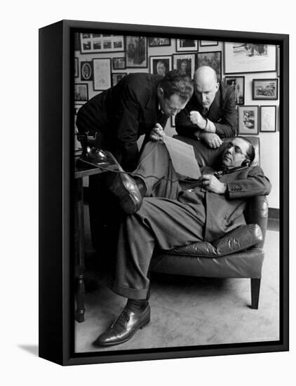 Press Agent Steve Hannagan on Phone as Assist. Joe Copps and Larry Smits Listen to His Conversation-Alfred Eisenstaedt-Framed Premier Image Canvas