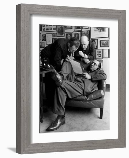 Press Agent Steve Hannagan on Phone as Assist. Joe Copps and Larry Smits Listen to His Conversation-Alfred Eisenstaedt-Framed Photographic Print