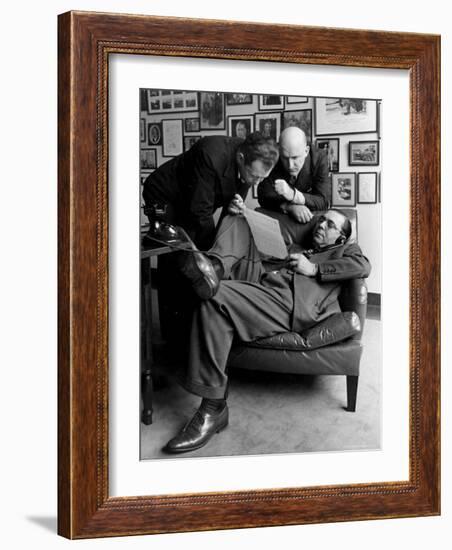 Press Agent Steve Hannagan on Phone as Assist. Joe Copps and Larry Smits Listen to His Conversation-Alfred Eisenstaedt-Framed Photographic Print