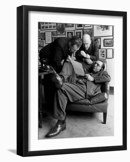 Press Agent Steve Hannagan on Phone as Assist. Joe Copps and Larry Smits Listen to His Conversation-Alfred Eisenstaedt-Framed Photographic Print