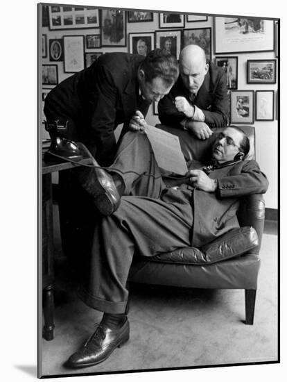 Press Agent Steve Hannagan on Phone as Assist. Joe Copps and Larry Smits Listen to His Conversation-Alfred Eisenstaedt-Mounted Photographic Print