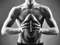 Close-Up of Topless Man Holding Rugby Ball in Isolation-pressmaster-Photographic Print