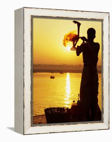 Priest Moves Lantern in Front of Sun During Morning Puja on Ganga Ma, Varanasi, India-Anthony Plummer-Framed Premier Image Canvas