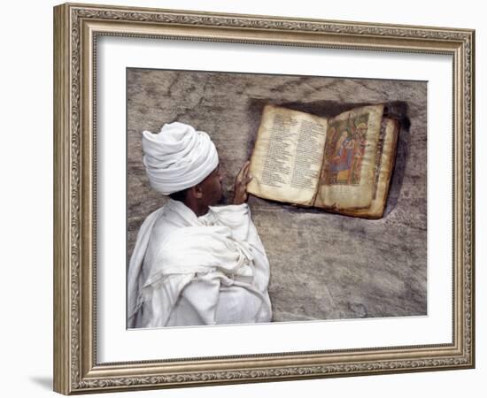 Priest of Ethiopian Orthodox Church Reads Old Bible at Rock-Hewn Church of Yohannes Maequddi-Nigel Pavitt-Framed Photographic Print