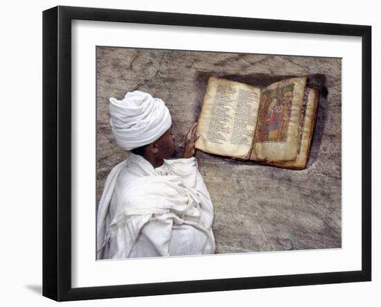 Priest of Ethiopian Orthodox Church Reads Old Bible at Rock-Hewn Church of Yohannes Maequddi-Nigel Pavitt-Framed Photographic Print