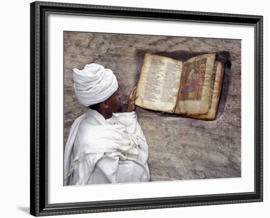 Priest of Ethiopian Orthodox Church Reads Old Bible at Rock-Hewn Church of Yohannes Maequddi-Nigel Pavitt-Framed Photographic Print