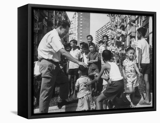 Prime Minister Kuan Yew Lee Talking to Children While Visiting a Housing Project-null-Framed Premier Image Canvas