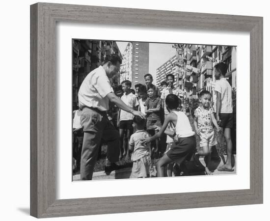 Prime Minister Kuan Yew Lee Talking to Children While Visiting a Housing Project-null-Framed Photographic Print