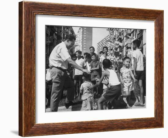 Prime Minister Kuan Yew Lee Talking to Children While Visiting a Housing Project-null-Framed Photographic Print