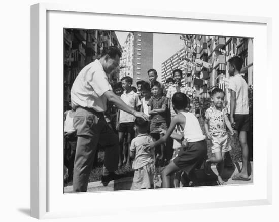 Prime Minister Kuan Yew Lee Talking to Children While Visiting a Housing Project-null-Framed Photographic Print