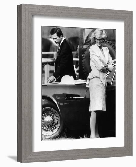 Prince Charles Examining the Bodywork of His Aston Martin-null-Framed Photographic Print