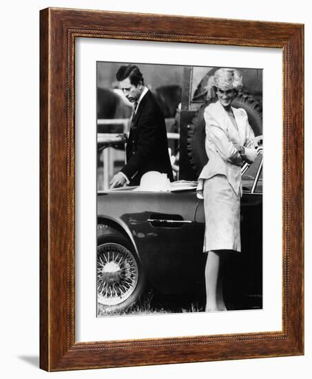 Prince Charles Examining the Bodywork of His Aston Martin-null-Framed Photographic Print