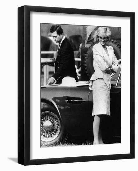 Prince Charles Examining the Bodywork of His Aston Martin-null-Framed Photographic Print