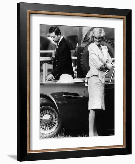 Prince Charles Examining the Bodywork of His Aston Martin-null-Framed Photographic Print