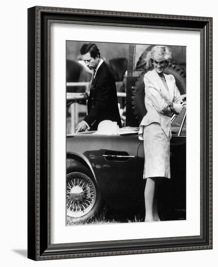 Prince Charles Examining the Bodywork of His Aston Martin-null-Framed Photographic Print