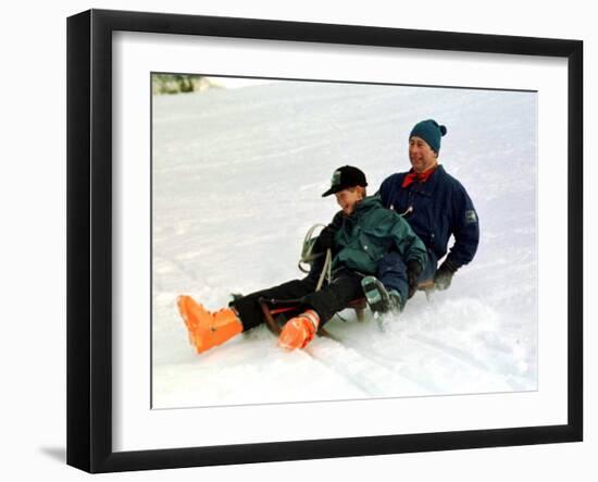 Prince Charles on a Sledge with Prince Harry While on Holiday in Klosters Switzerland January 1997-null-Framed Photographic Print