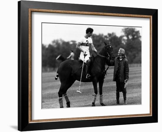 Prince Charles Sits on Horse in Polo Game July 1979-null-Framed Photographic Print