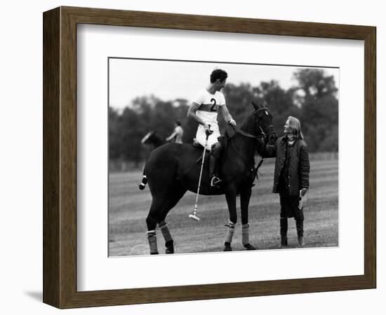 Prince Charles Sits on Horse in Polo Game July 1979-null-Framed Photographic Print