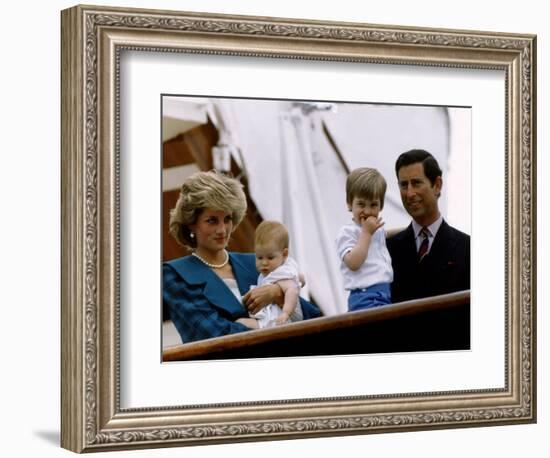 Prince Charles stands holding sons Prince William and Prince Harry with Princess Diana, Circa 1985-null-Framed Photographic Print