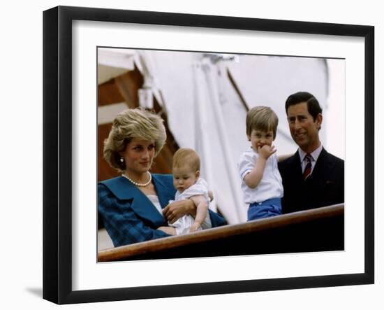 Prince Charles stands holding sons Prince William and Prince Harry with Princess Diana, Circa 1985-null-Framed Photographic Print