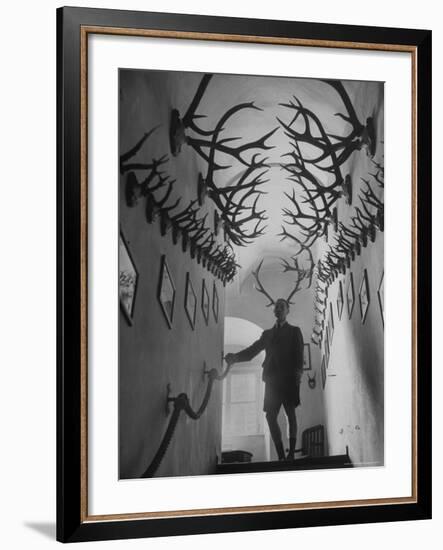 Prince Franz Joseph of Thurn and Taxis Amidst Collection of 2,000 Deer Antlers and Antelope Horns-Walter Sanders-Framed Premium Photographic Print