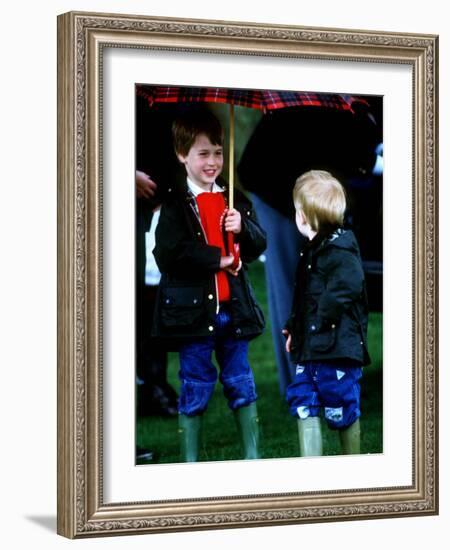 Prince Harry on right with Prince William at a polo match in Cirencester-null-Framed Photographic Print