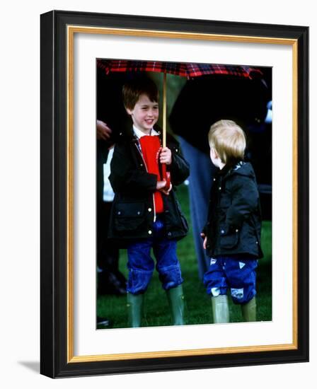 Prince Harry on right with Prince William at a polo match in Cirencester-null-Framed Photographic Print