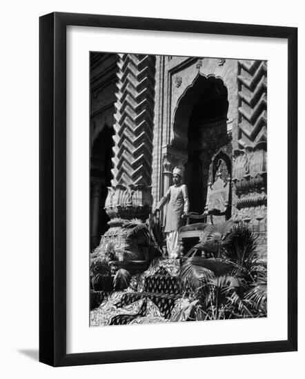 Prince of Khairpur, George Alimurad Khan Talpur, Holding Sword as He Stands in Front of His Throne-Margaret Bourke-White-Framed Photographic Print