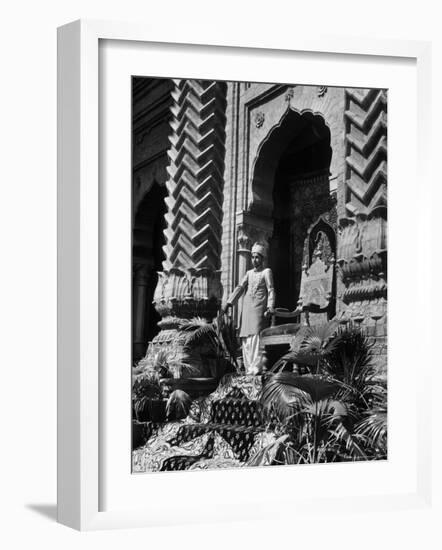 Prince of Khairpur, George Alimurad Khan Talpur, Holding Sword as He Stands in Front of His Throne-Margaret Bourke-White-Framed Photographic Print