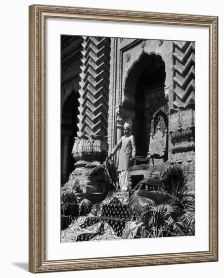 Prince of Khairpur, George Alimurad Khan Talpur, Holding Sword as He Stands in Front of His Throne-Margaret Bourke-White-Framed Photographic Print