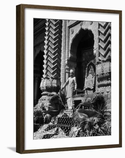 Prince of Khairpur, George Alimurad Khan Talpur, Holding Sword as He Stands in Front of His Throne-Margaret Bourke-White-Framed Photographic Print