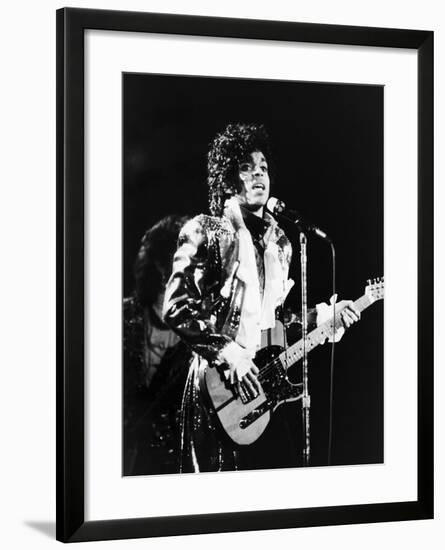 Prince, Rocks the Stage During His Purple Rain Tour in 1984-Vandell Cobb-Framed Photographic Print