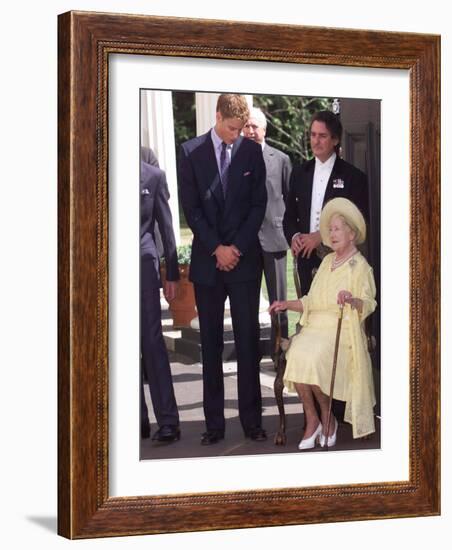 Prince William bends down to talk to The Queen Mother outside Clarence House where she was celebrat-null-Framed Photographic Print