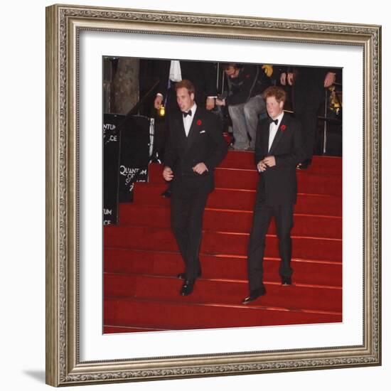 Prince William (left) and his brother Prince Harry arrive for the world premiere of the new James B-null-Framed Photographic Print