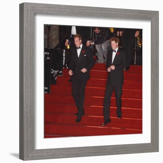 Prince William (left) and his brother Prince Harry arrive for the world premiere of the new James B-null-Framed Photographic Print