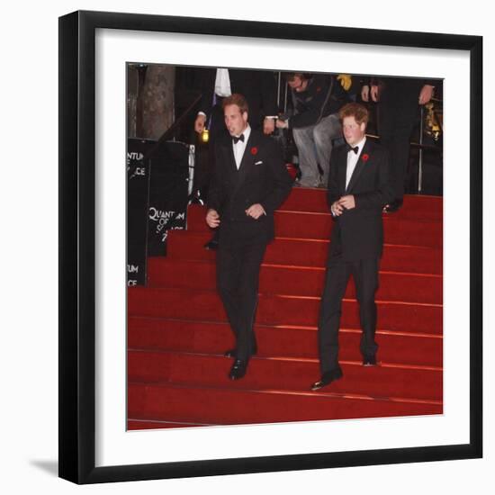 Prince William (left) and his brother Prince Harry arrive for the world premiere of the new James B-null-Framed Photographic Print