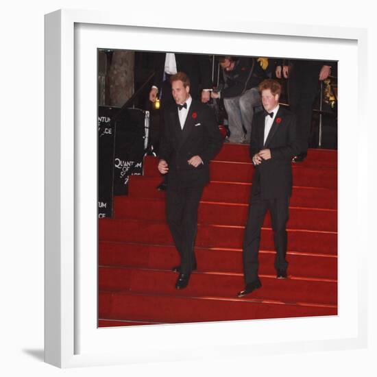 Prince William (left) and his brother Prince Harry arrive for the world premiere of the new James B-null-Framed Photographic Print