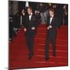 Prince William (left) and his brother Prince Harry arrive for the world premiere of the new James B-null-Mounted Photographic Print
