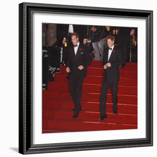 Prince William (left) and his brother Prince Harry arrive for the world premiere of the new James B-null-Framed Photographic Print