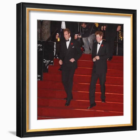 Prince William (left) and his brother Prince Harry arrive for the world premiere of the new James B-null-Framed Photographic Print